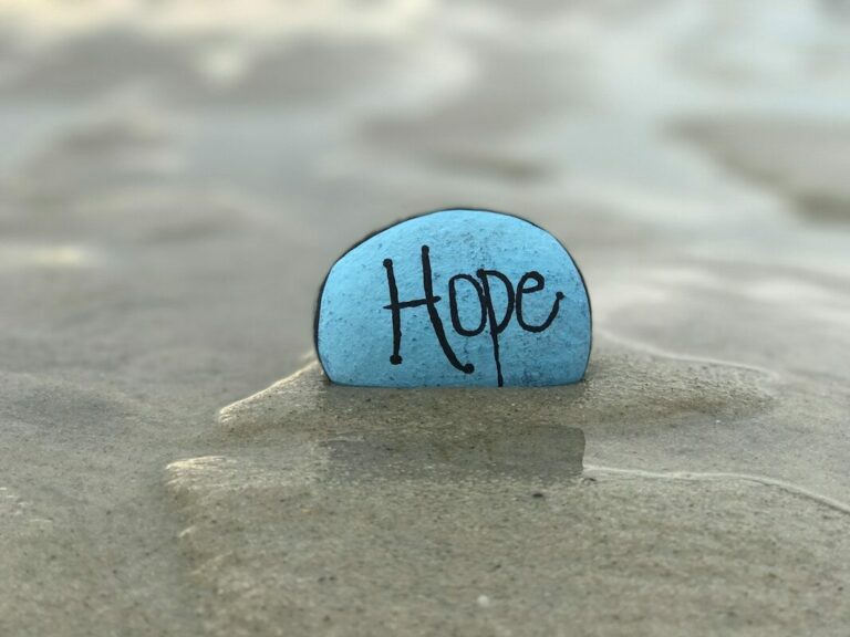 gray hope-printed stone in
